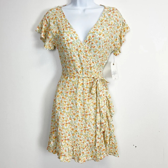 Billabong Dresses & Skirts - Billabong Wrap Dress Womens Size XS Yellow Floral Short Sleeve VNeck NWT